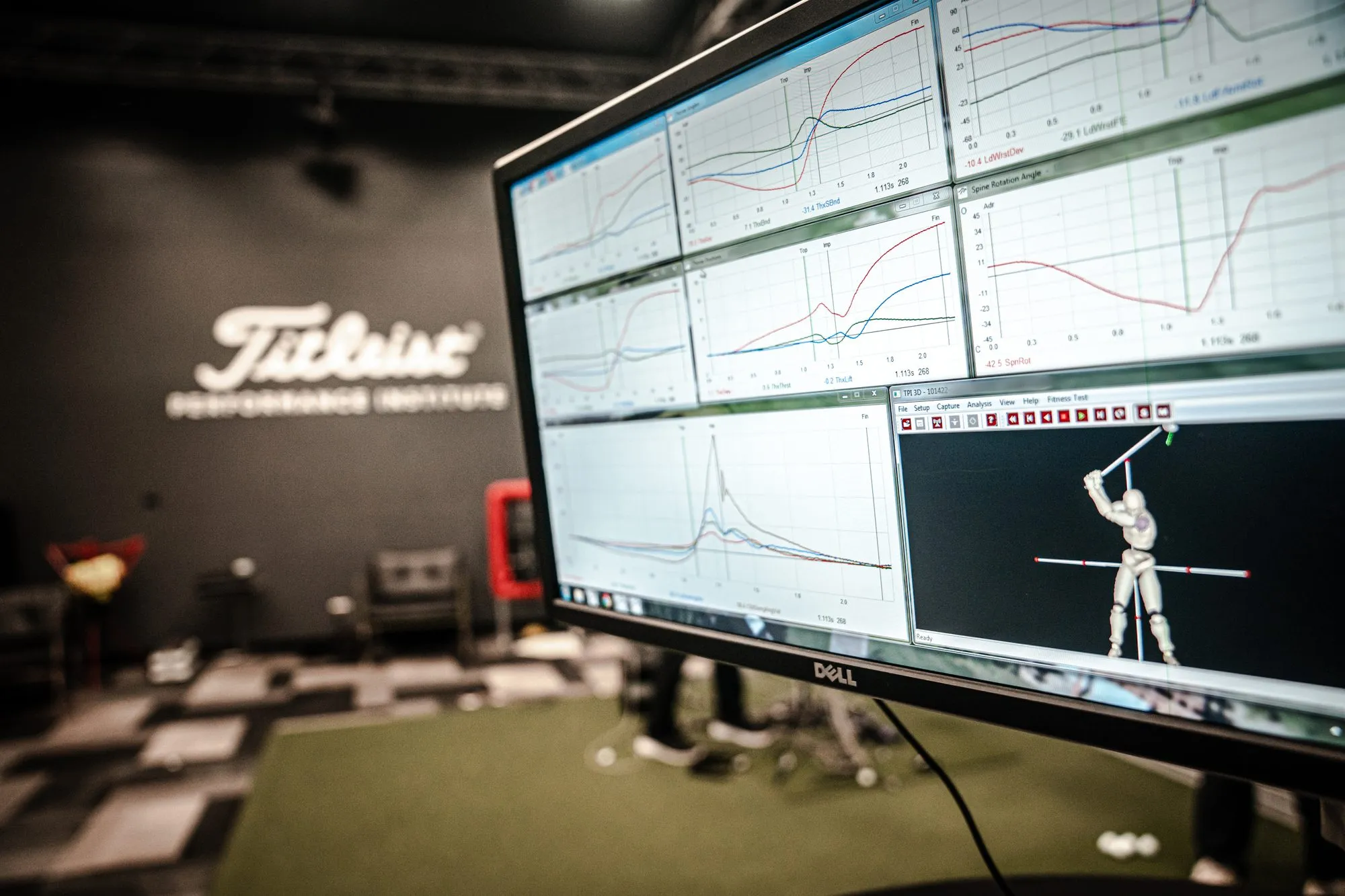 TPI 3D motion capture software showing spine rotation, thorax and wrist angle
               traces alongside a modelled swing